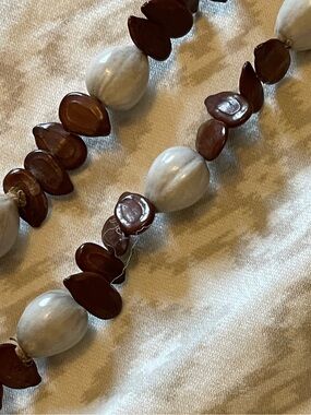 Vintage Ethiopian handcrafted seed necklace featuring hand-painted seeds